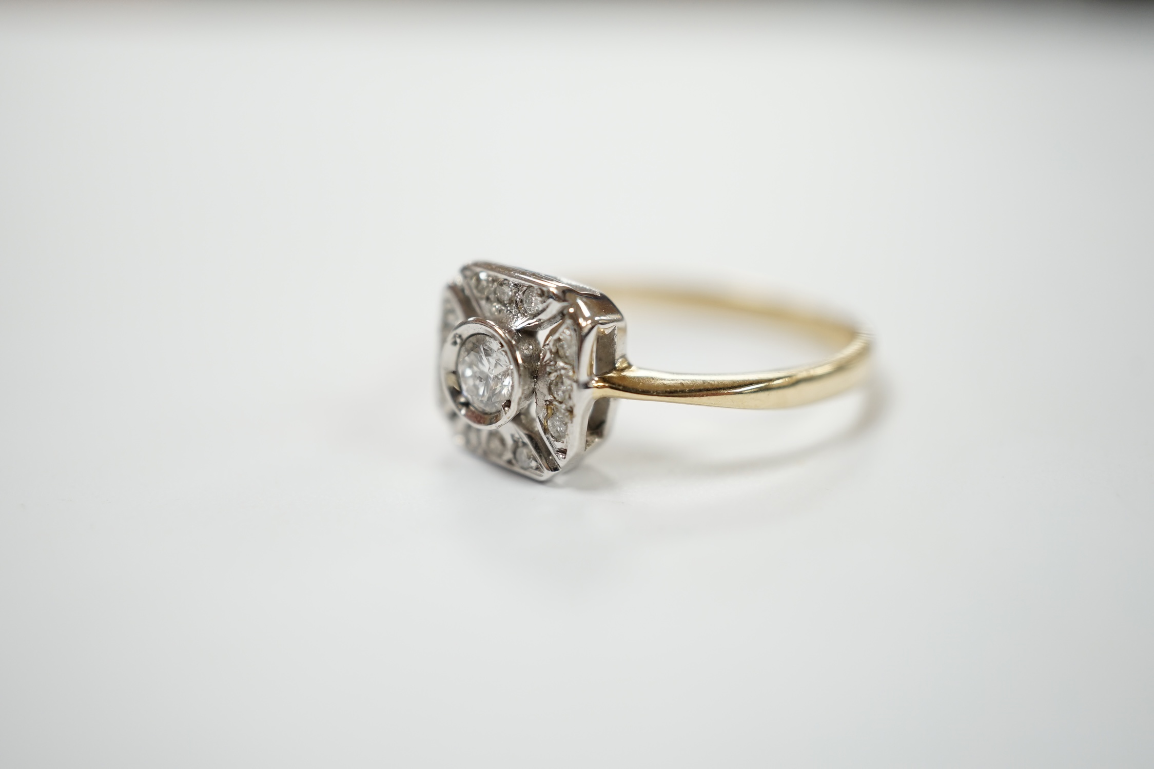 A modern 1920's style 9ct gold and diamond set cluster ring, size P, gross weight 2.6 grams. Condition - fair to good